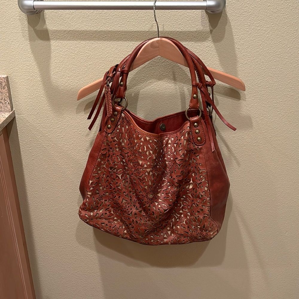 Isabella Fiore woman's brown laser cut leather purse